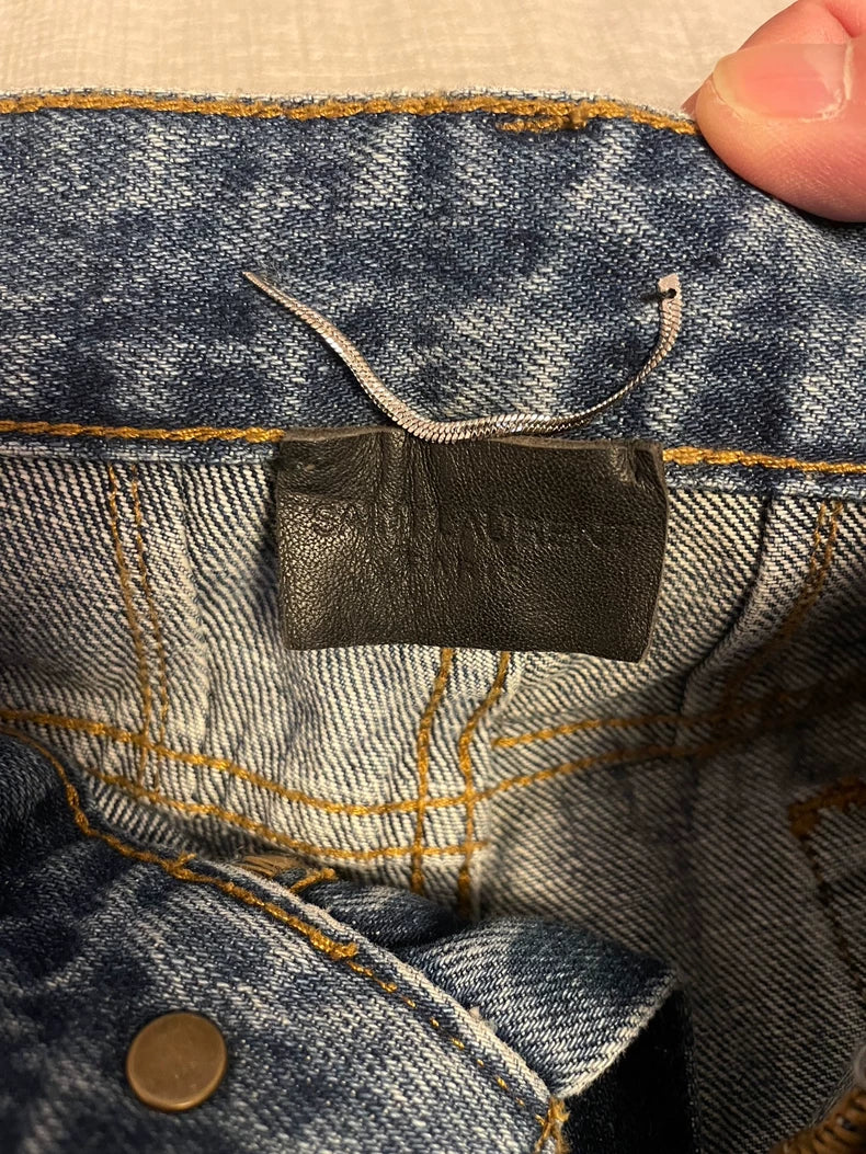 Saint Laurent Distressed Denim Pants for Men