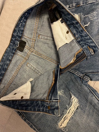 Saint Laurent Distressed Denim Pants for Men