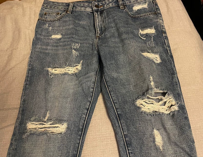 Saint Laurent Distressed Denim Pants for Men