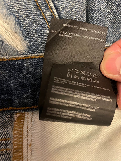 Saint Laurent Distressed Denim Pants for Men