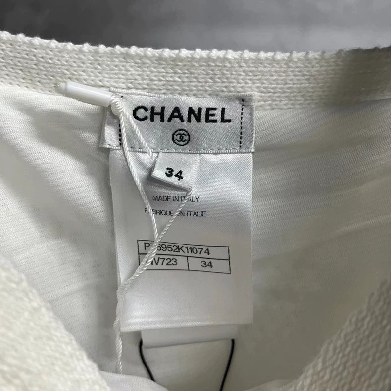 White Embossed Logo Dress by Chanel
