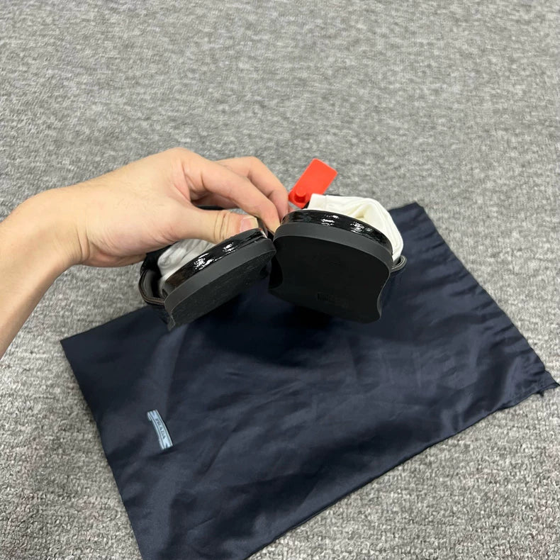 Prada Triangle Logo Flat Slip-Ons