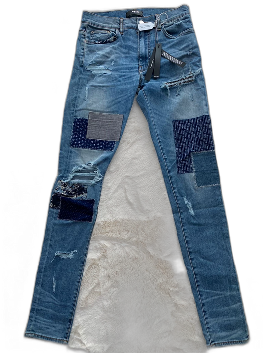 Amiri Distressed Patchwork Denim Jeans