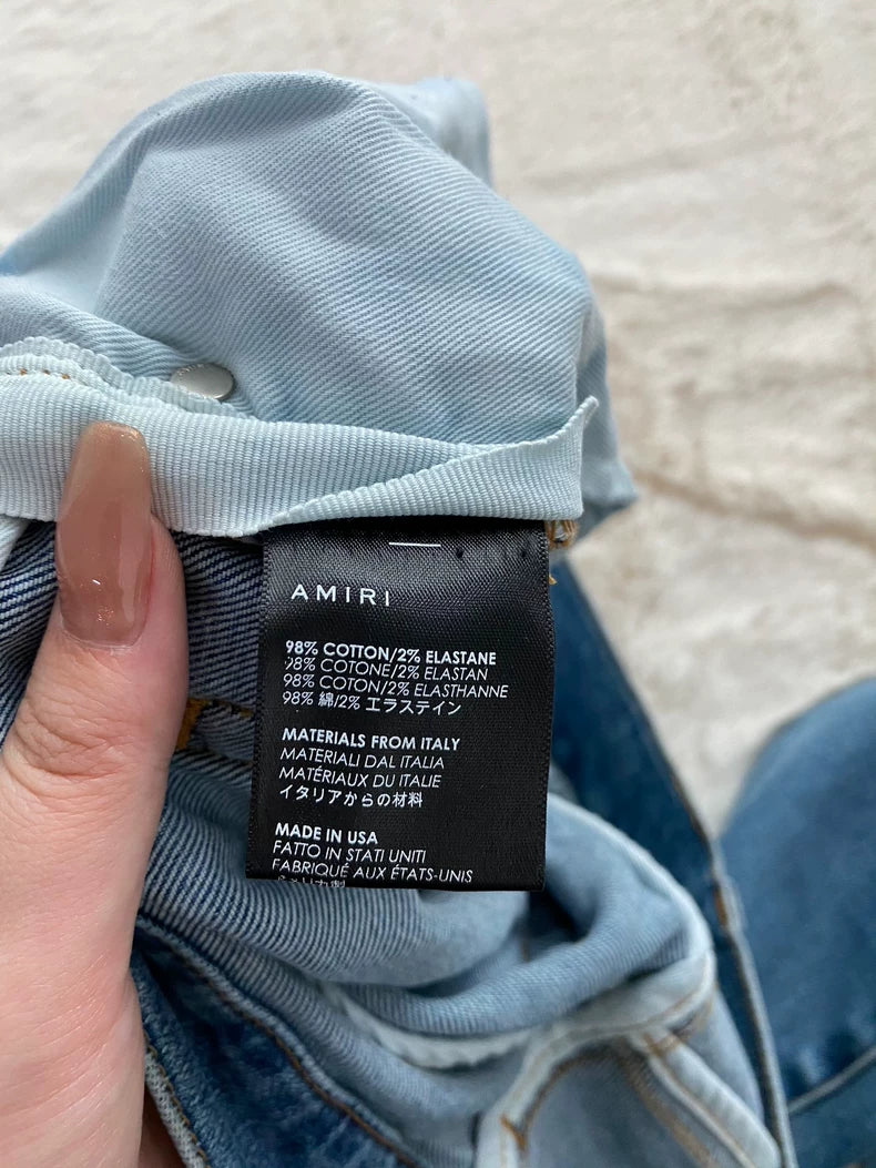 Amiri Distressed Patchwork Denim Jeans