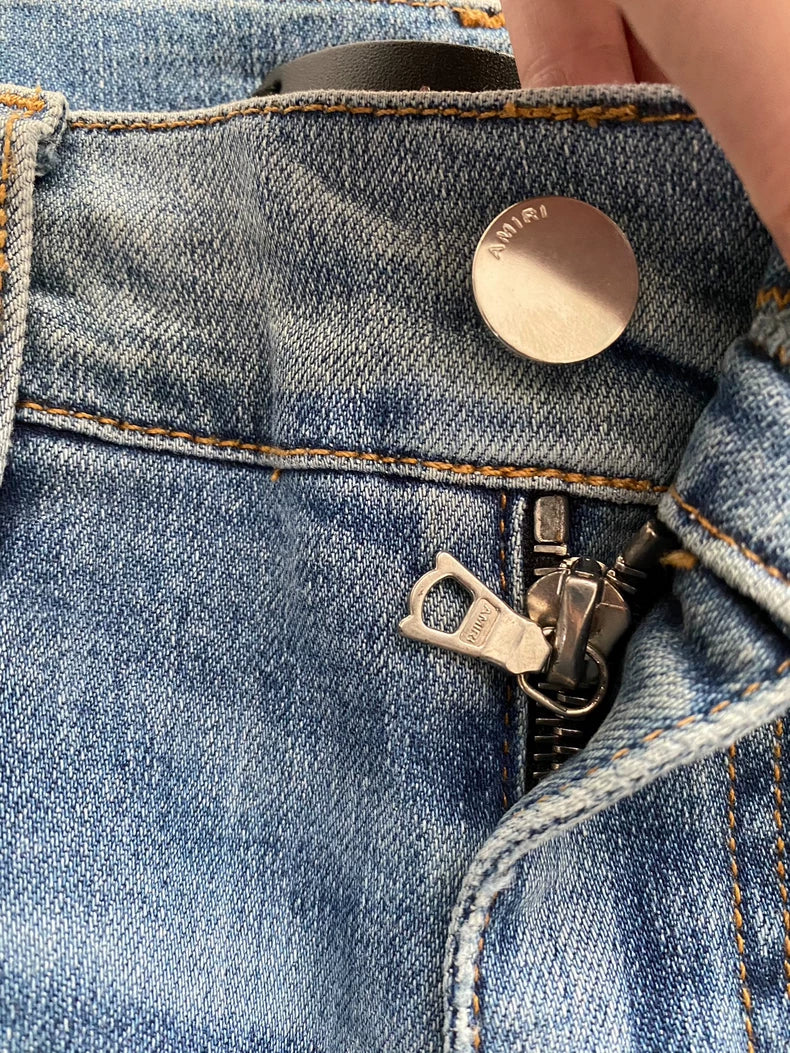 Amiri Distressed Patchwork Denim Jeans