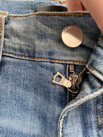 Amiri Distressed Patchwork Denim Jeans