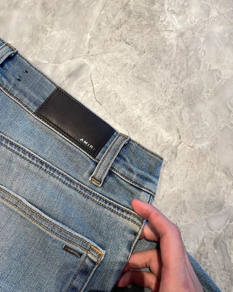 Amiri Thrash MX1 Denim Pants in Blue