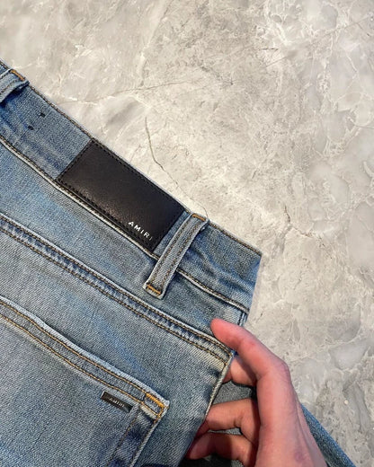 Amiri Thrash MX1 Denim Pants in Blue