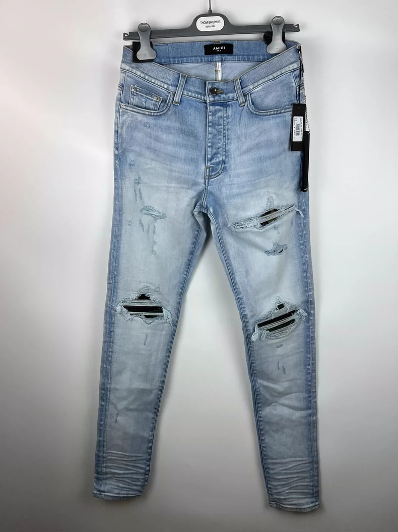 Amiri Camouflage Distressed Denim Jeans