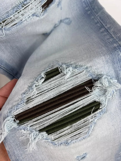 Amiri Camouflage Distressed Denim Jeans