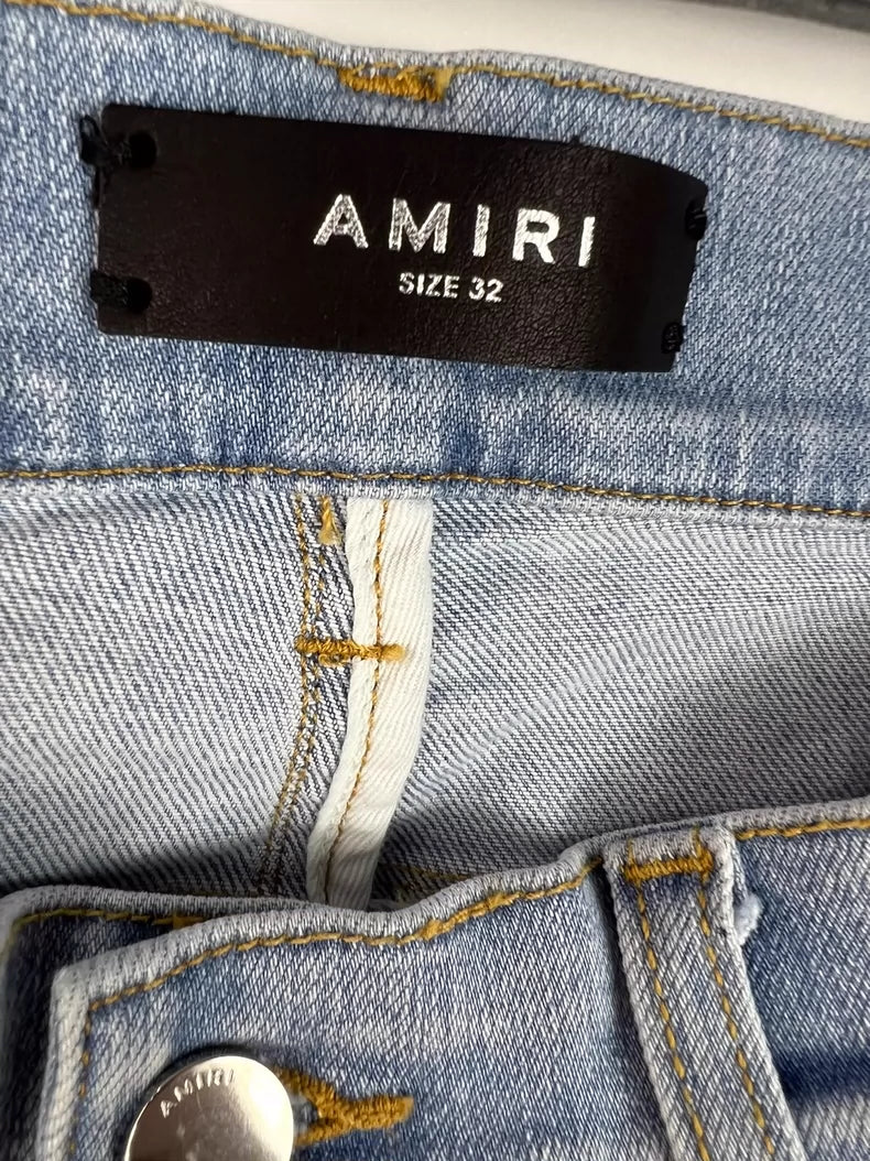 Amiri Camouflage Distressed Denim Jeans