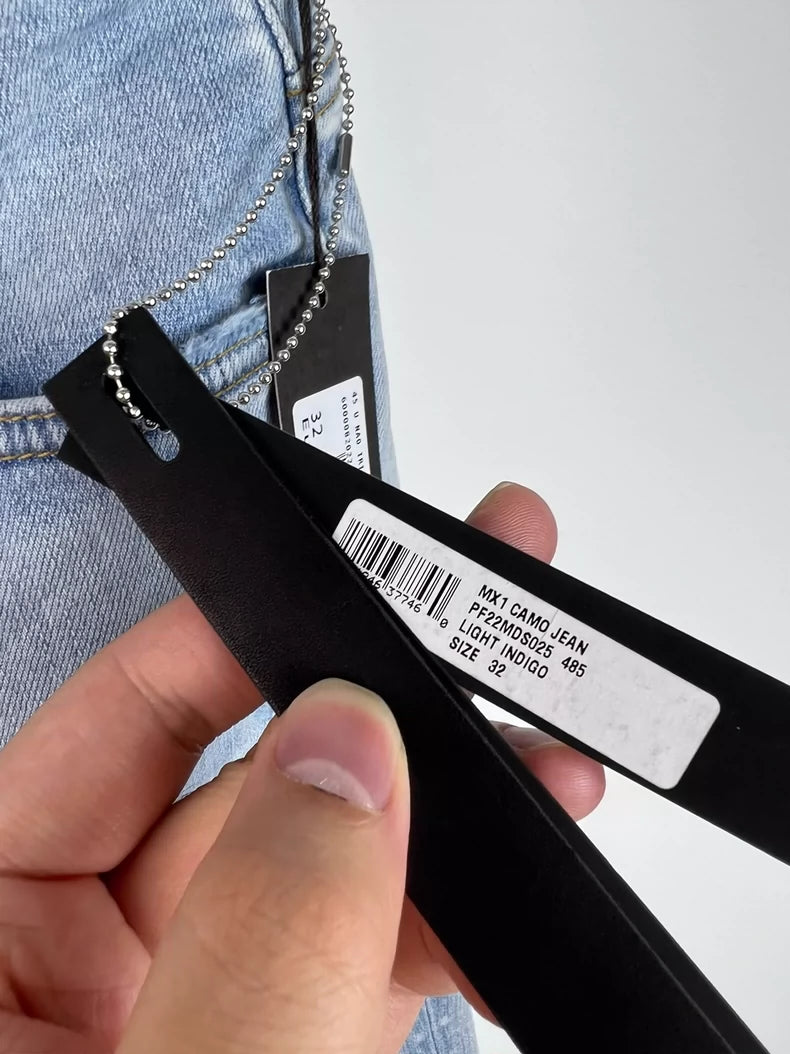 Amiri Camouflage Distressed Denim Jeans