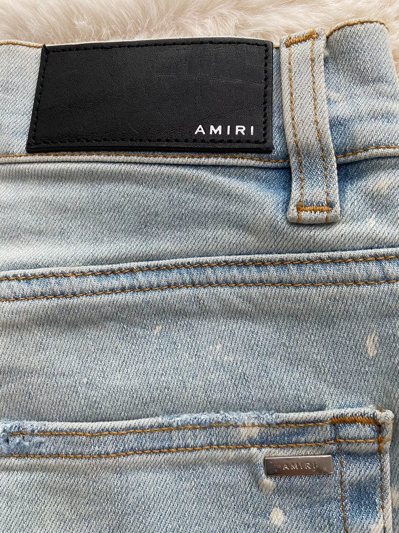 Distressed Blue Denim Pants by Amiri