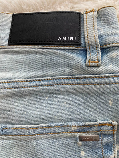 Distressed Blue Denim Pants by Amiri