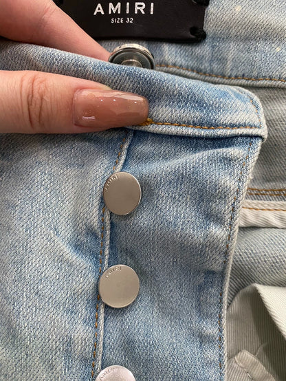 Distressed Blue Denim Pants by Amiri