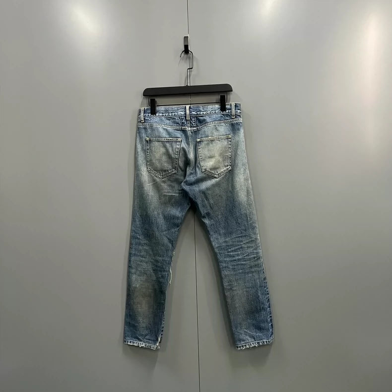 Saint Laurent Distressed Slim Fit Jeans
