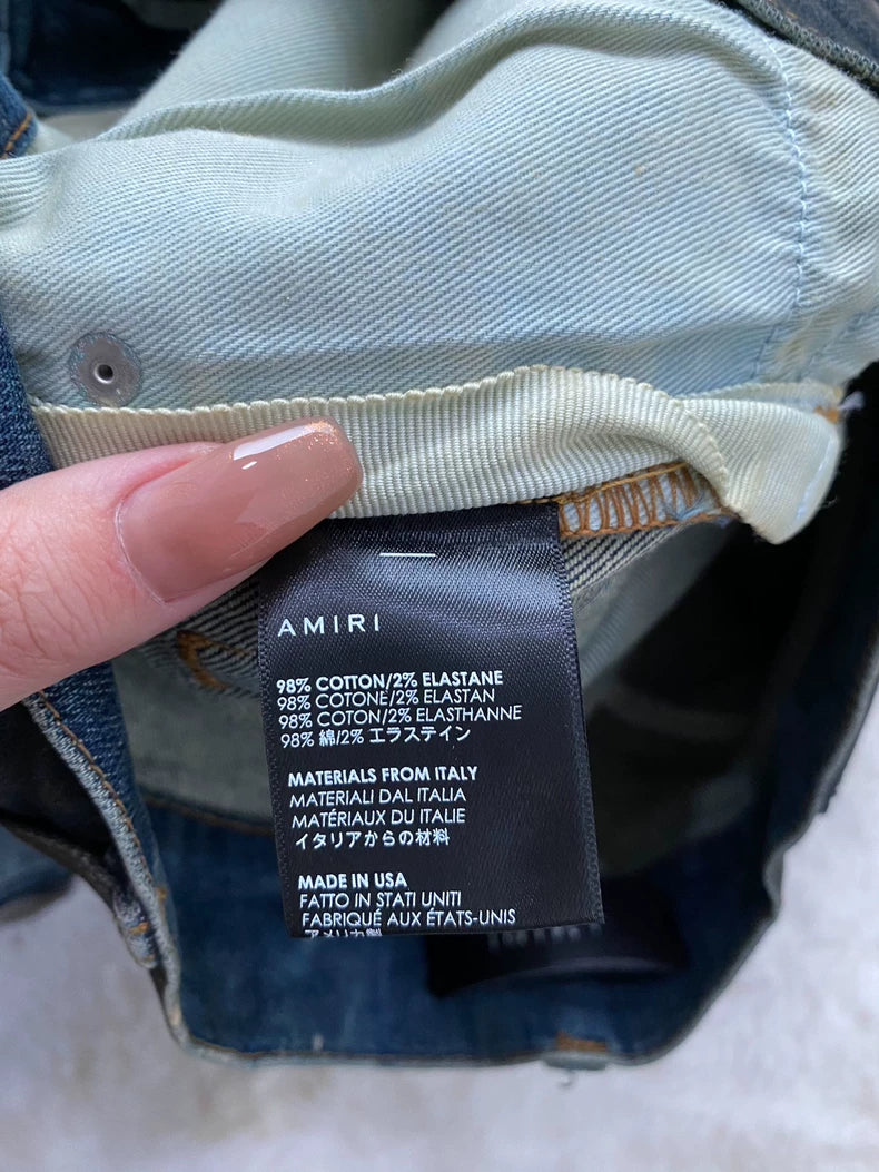 Amiri Washed Blue Distressed Jeans