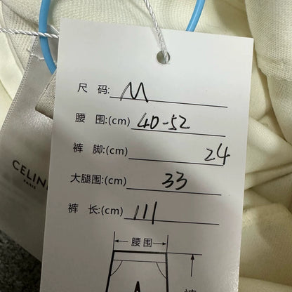 Celine Button-Up Pants in Cream Color