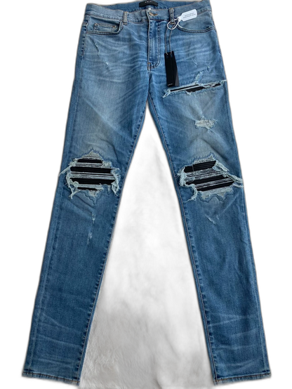 Amiri Worn Look Distressed Jeans