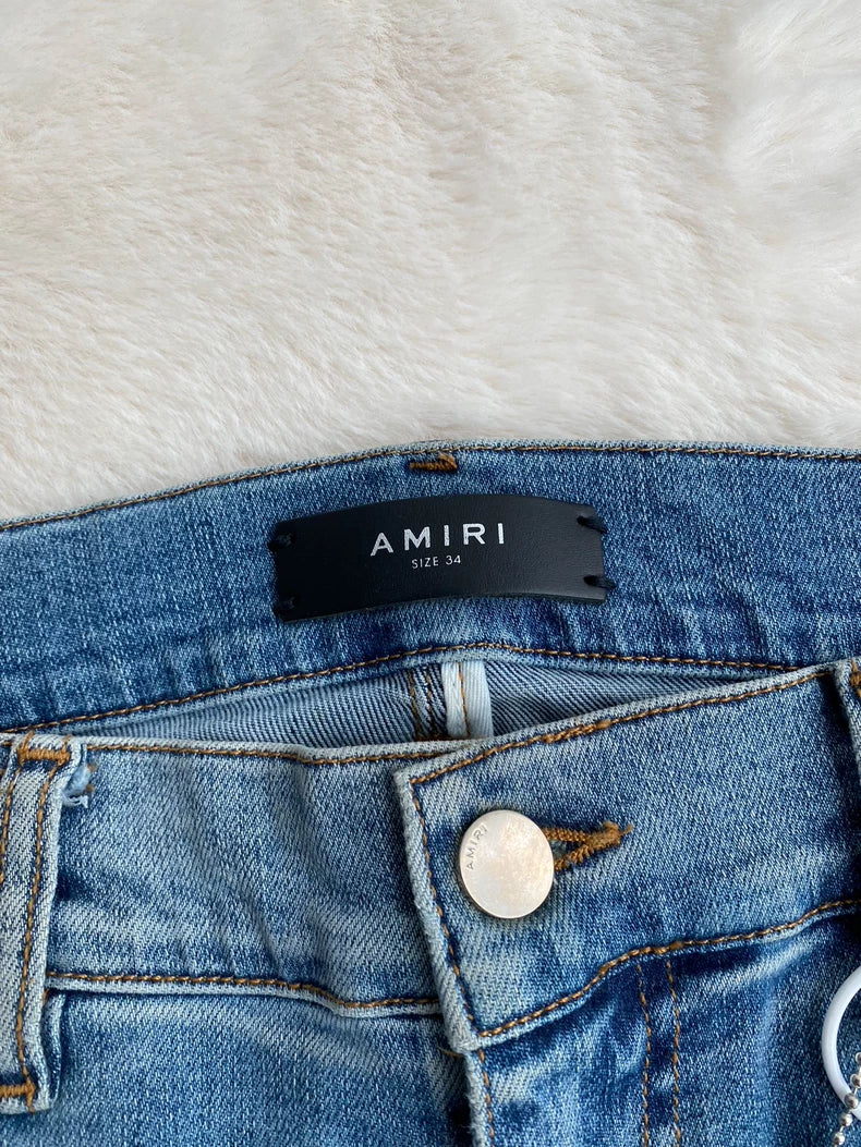 Amiri Worn Look Distressed Jeans