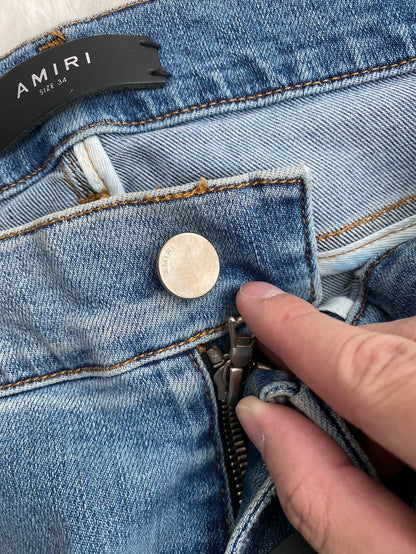 Amiri Worn Look Distressed Jeans