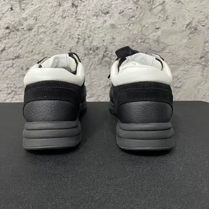 Chanel Black and White Sneakers
