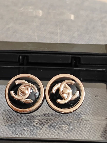 Chanel Round Logo Earrings in Black