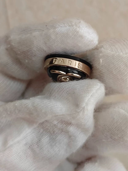 Chanel Round Logo Earrings in Black