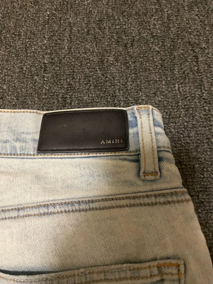 Amiri Distressed High-Stretch Denim Jeans-yf