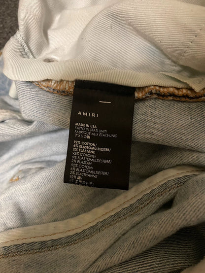 Amiri Distressed High-Stretch Denim Jeans-yf