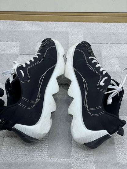 Stylish Hermes Black and White Sneakers