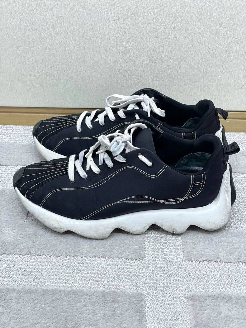 Stylish Hermes Black and White Sneakers