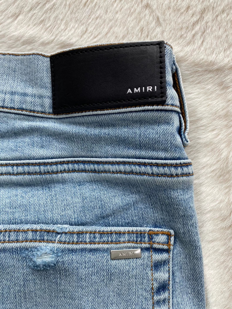 Amiri Light Wash Distressed Denim Jeans