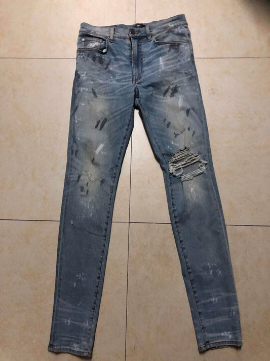 Amiri classic old splashed ink sole single torn blue jeans