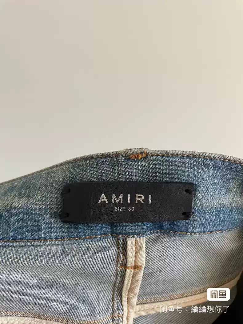 Amiri Rhinestone splashed blue jeans