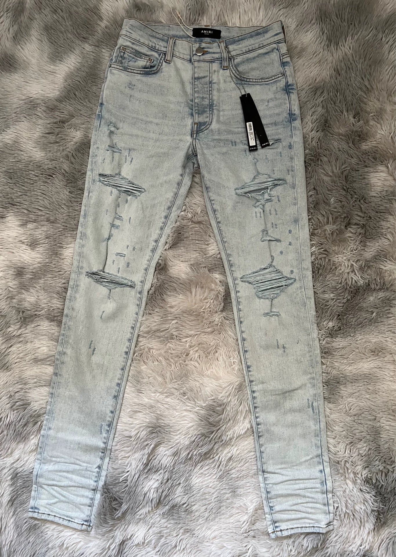 Amiri light colored washed denim jeans