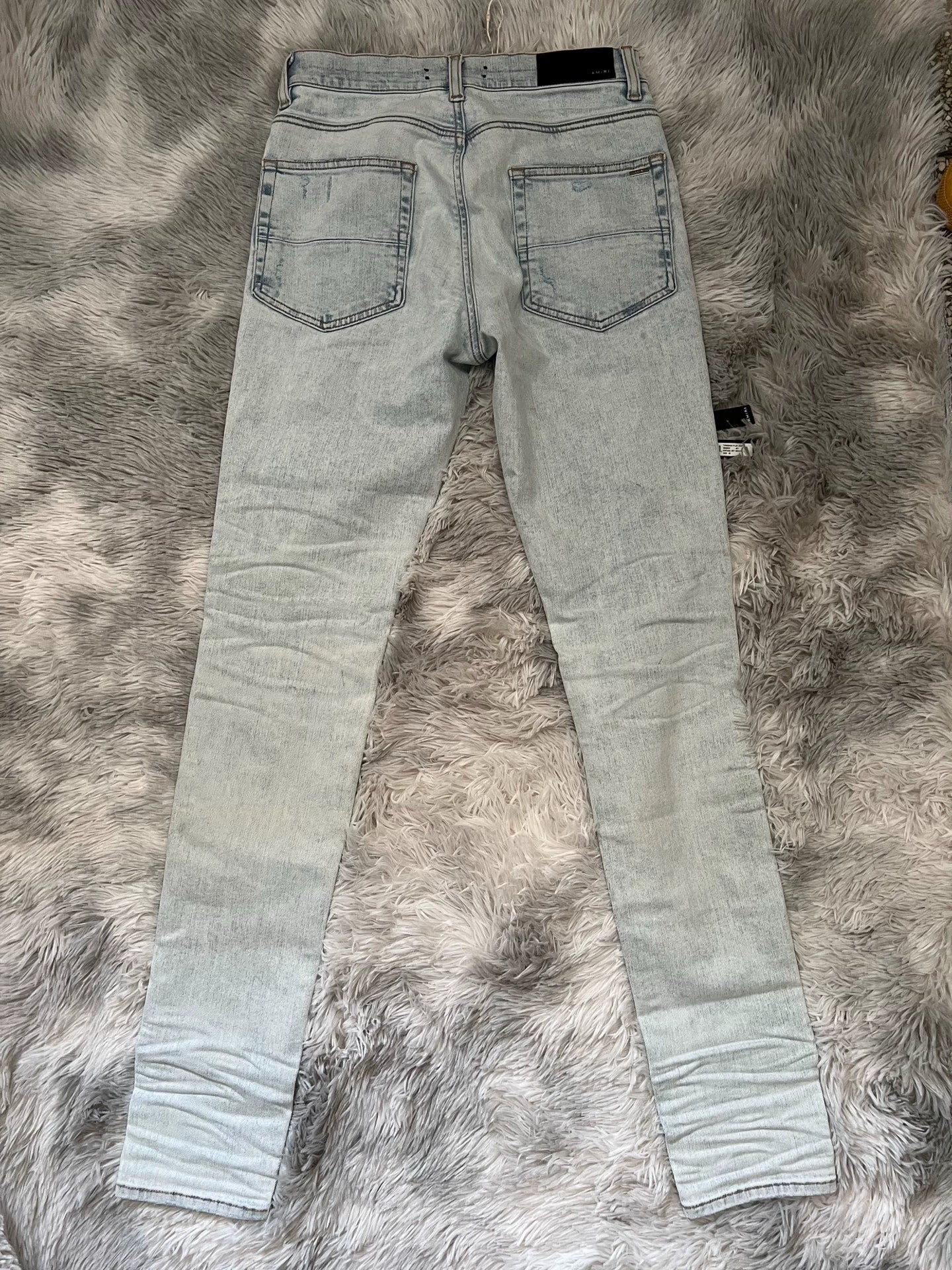 Amiri light colored washed denim jeans