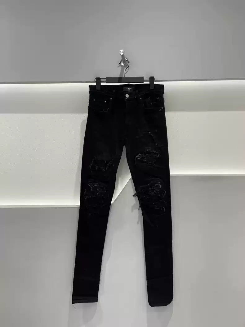 Amiri MX1 patchwork jeans