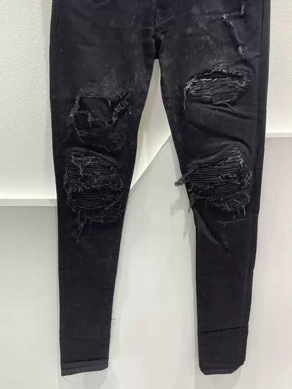 Amiri MX1 patchwork jeans