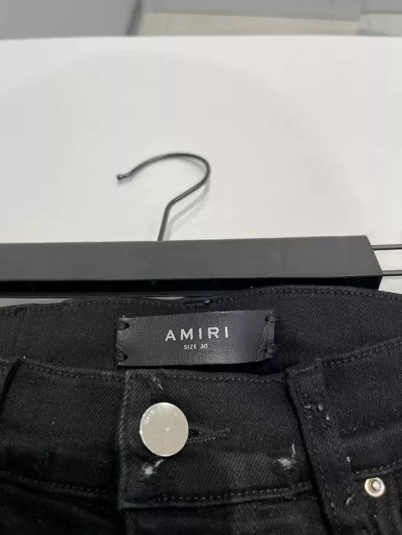 Amiri MX1 patchwork jeans