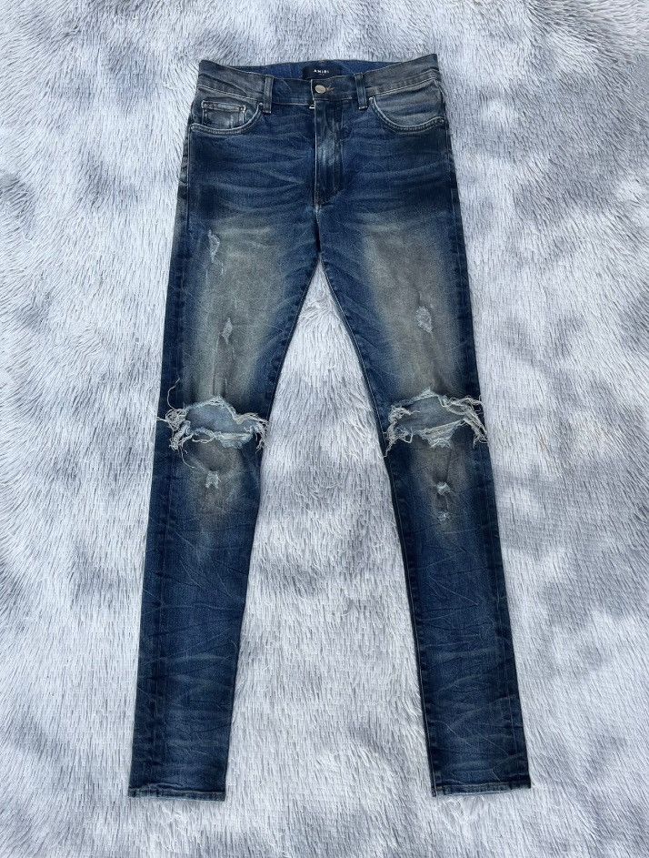 Amiri oil-stained metal damaged jeans - - DMC