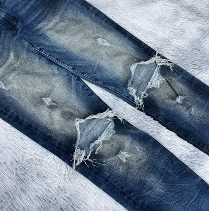 Amiri oil-stained metal damaged jeans - - DMC