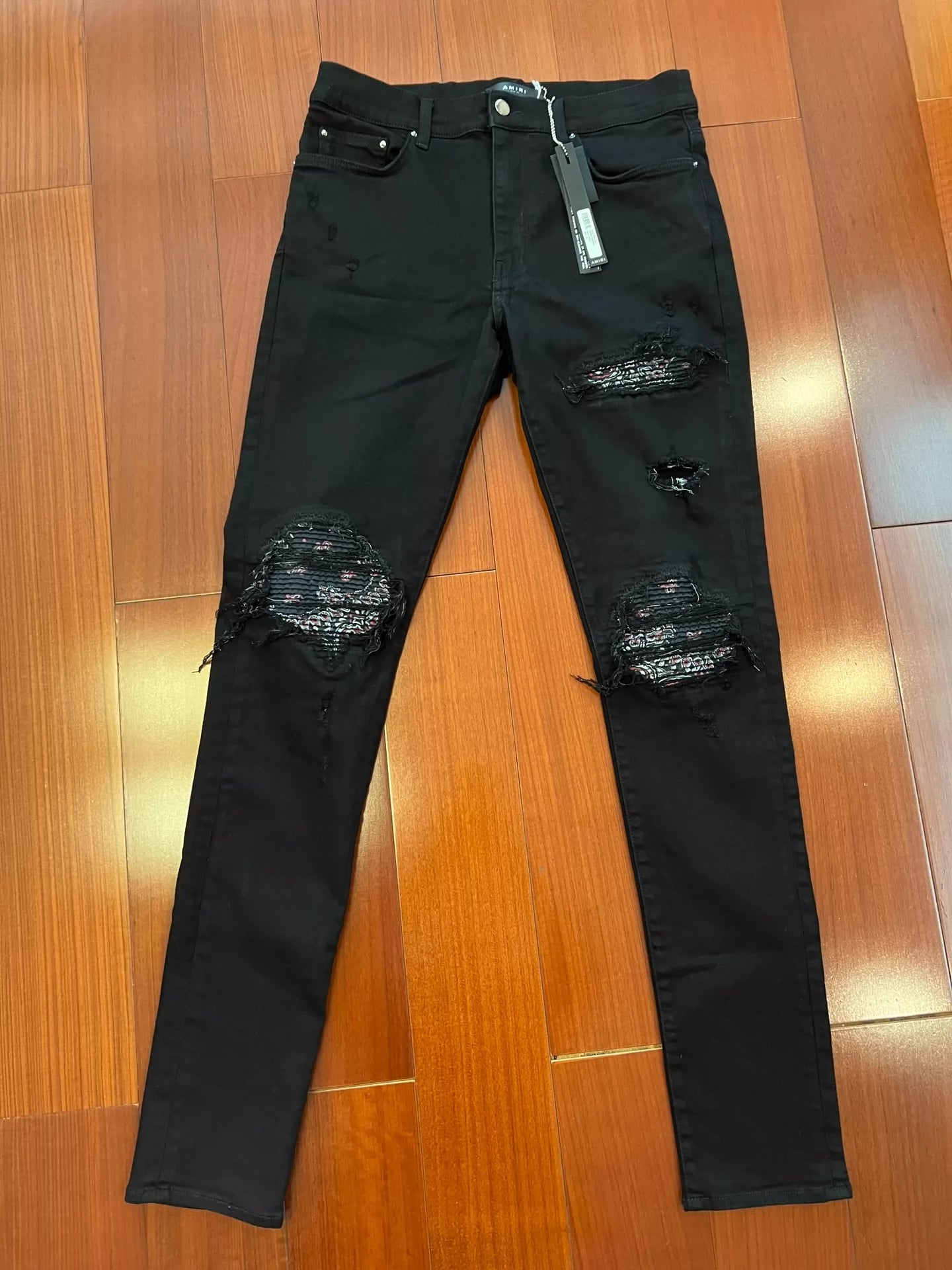 Amiri Classic 18aw Red Cashew Flower Spliced Black Jeans