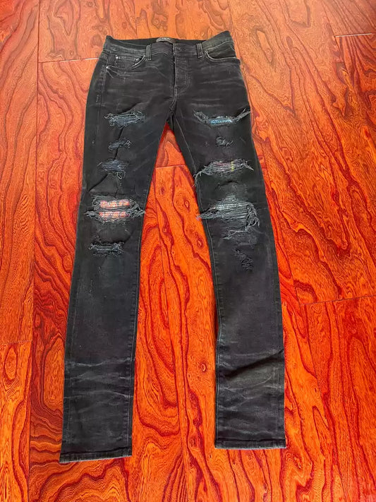 AMIRI ripped patch jeans