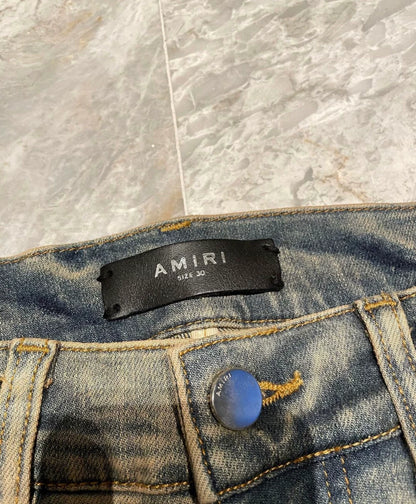 Amiri Classic Yellow Mud Cashew Flower Splicing Jeans