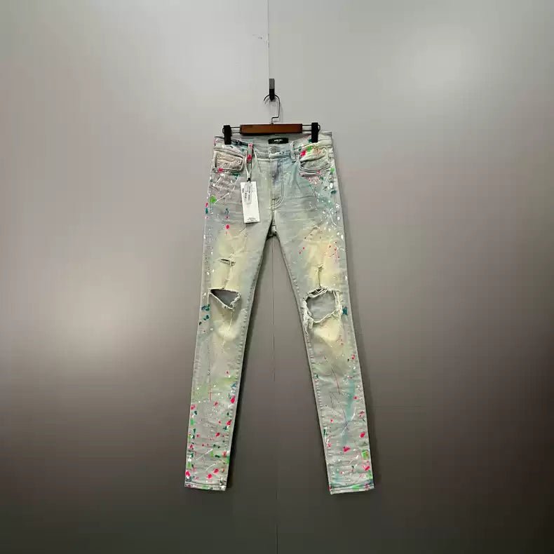 AMIRI splashed ink ripped jeans