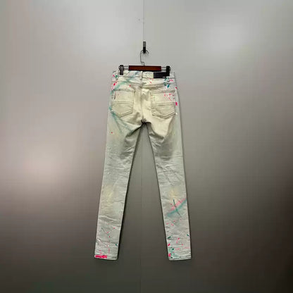 AMIRI splashed ink ripped jeans