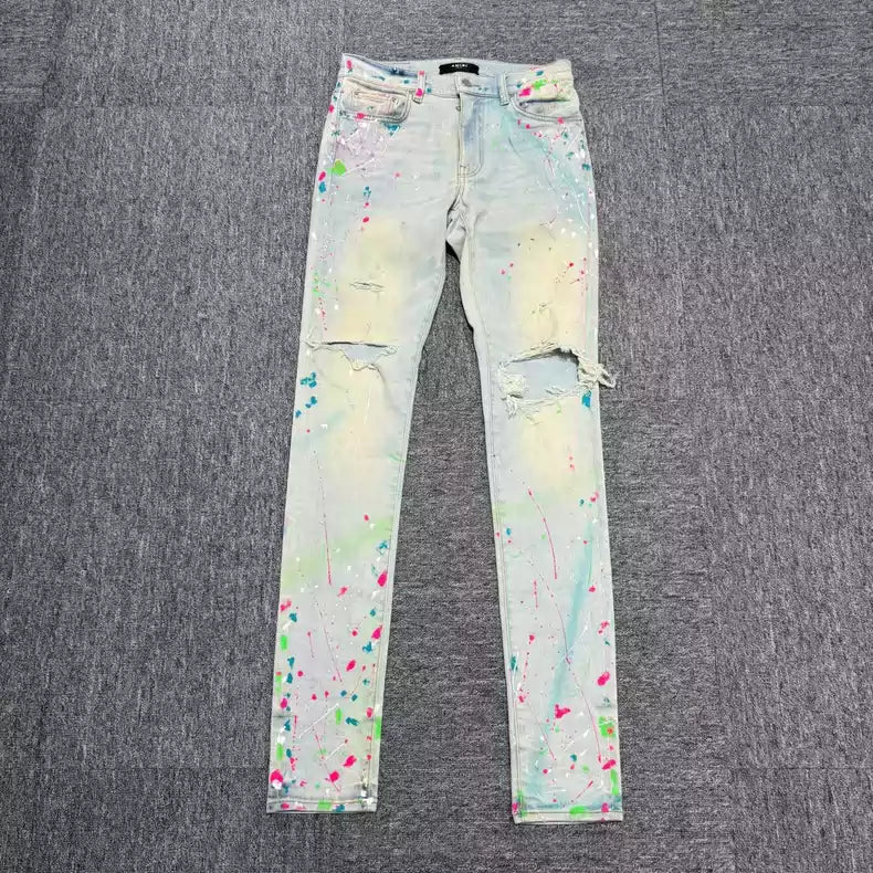 Amiri blue splashed ink ripped jeans