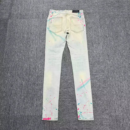 Amiri blue splashed ink ripped jeans