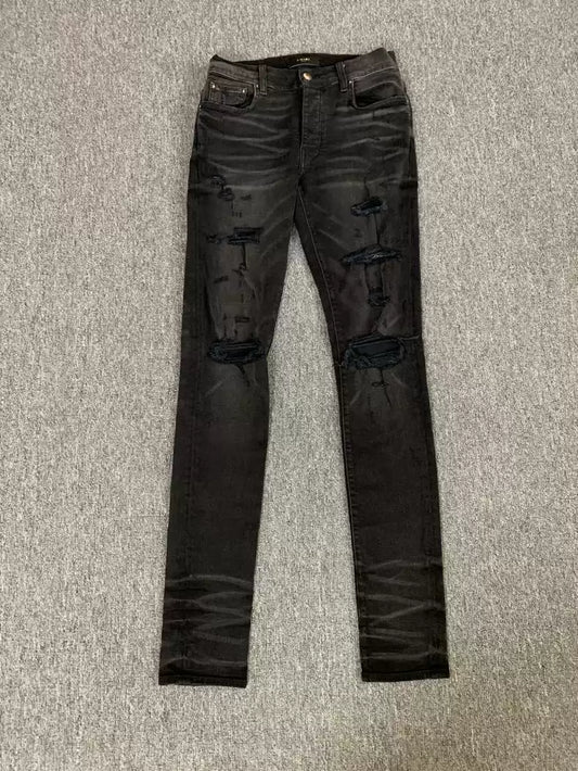 Amiri knee damaged jeans